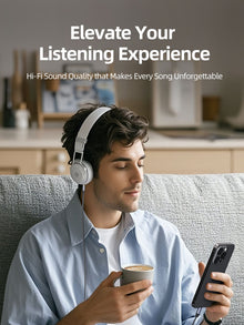 USB-C to 3.5mm AUX audio cable plugged into a smartphone next to headphones